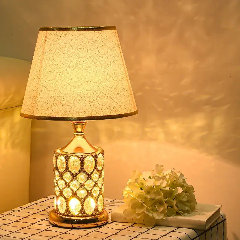 Elegant gold crystal table lamp with cream lace shade ideal for bedroom ambiance decorbites crystal table lamp