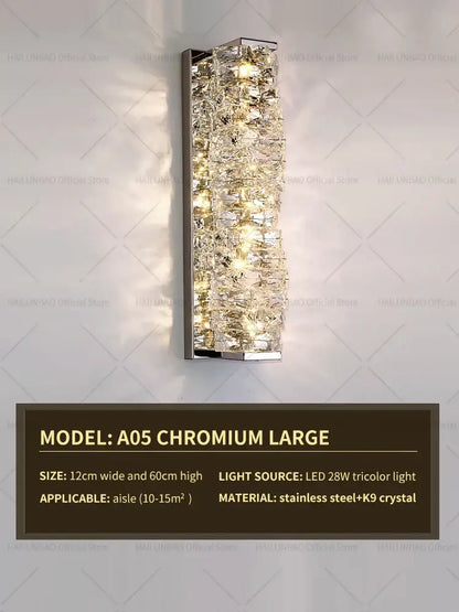 Elegant gold crystal wall lamp with rectangular chrome frame and cascading k9 crystals emitting warm led tricolor light