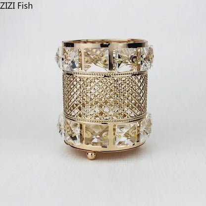 Elegant gold lattice hollow glass jar candle holder with intricate design and clear crystal accents for makeup brushes