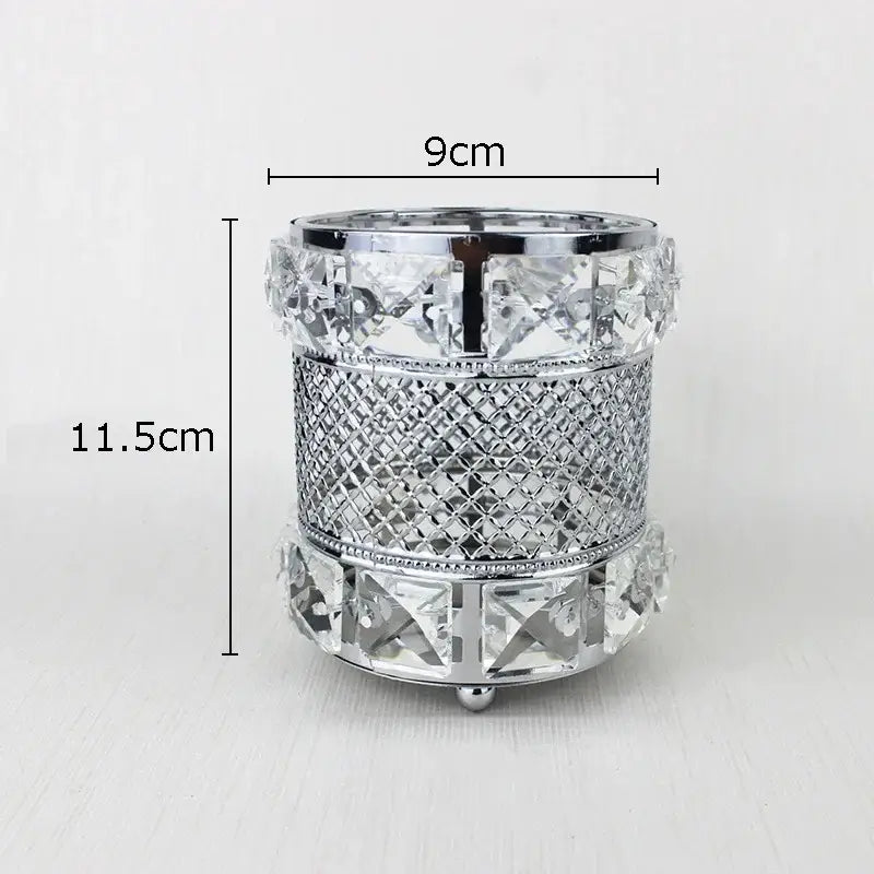 Elegant silver-toned crystal-encrusted hollow glass jar with diamond-cut pattern for bedroom makeup brush holder