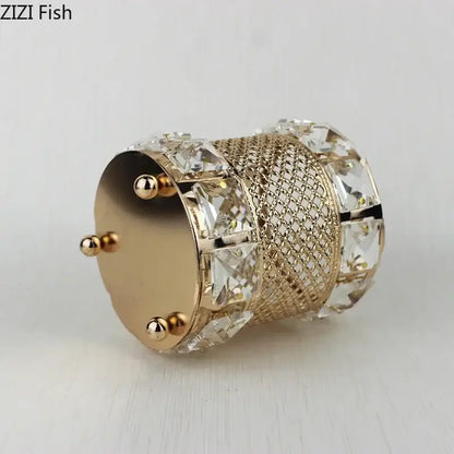Elegant gold lattice hollow glass jar makeup brush holder with cylindrical shape mesh pattern and clear crystal embellishments