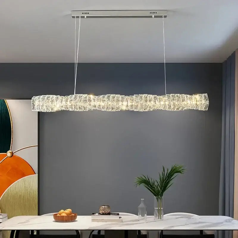 Elegant gold led crystal chandelier with textured rectangular design and warm lighting for dining room use