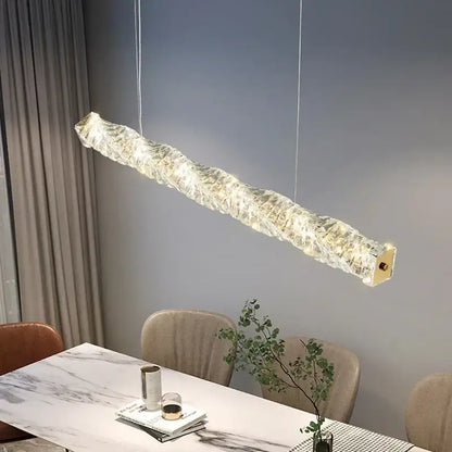 Elegant gold led crystal chandelier featuring a modern translucent glass pendant light with warm led illumination for dining room