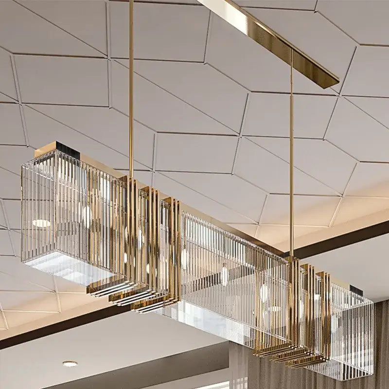 Elegant gold lustre pendant light with a gold-finished metal frame and vertical crystal rods for dining room decorbites elegant gold