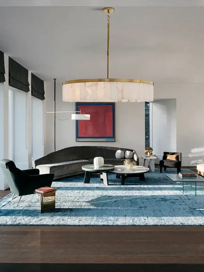 A modern pendant light with gold marble ceiling finish and layered translucent fabric shades for dining room decorbites gold marble