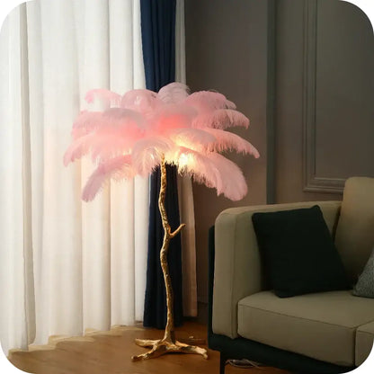 Elegant gold ostrich feather floor lamp with delicate pink feathers and a golden tree-like base for bedroom decorbites elegant ostrich design
