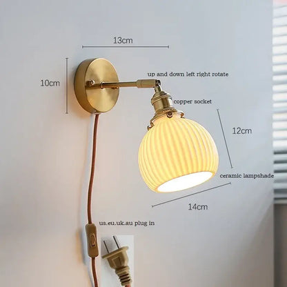 Brass-finished adjustable ceramic led wall light with ribbed gold ceramic lampshade for elegant bedroom decorbites ceramic led