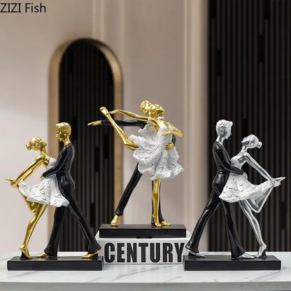 Three elegant home decor tango dancer figurines in metallic gold and silver suits with white lace dresses for living room