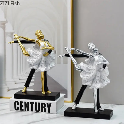 Two elegant gold and silver tango dancer figurines with white lace skirts and black pants for home decor by decorbites golden tango