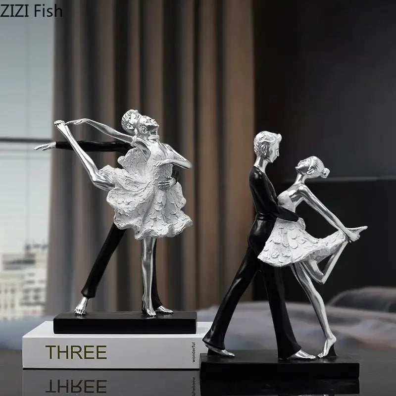 Silver and black ballet dancer figurines with textured costumes on sleek bases perfect for home decor and decorbites golden tango