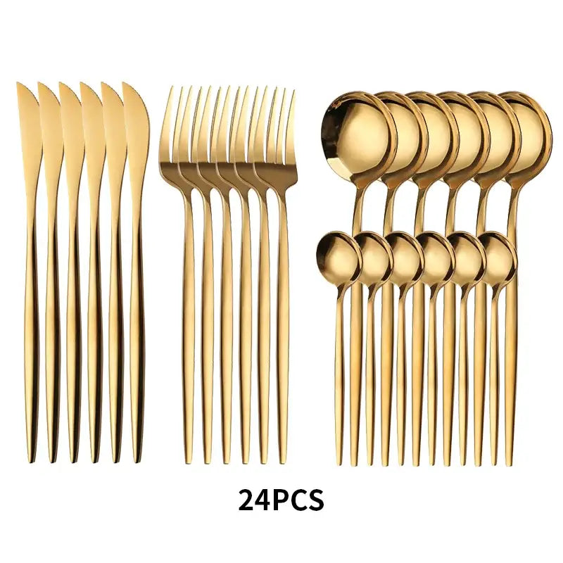 Elegant gold stainless steel 24-piece cutlery set with sleek modern design in a dining room gift box