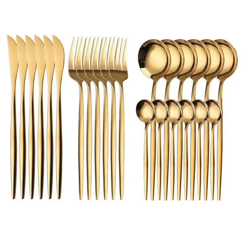 Elegant gold stainless steel cutlery set with sleek modern design in a dining room gift box for table settings