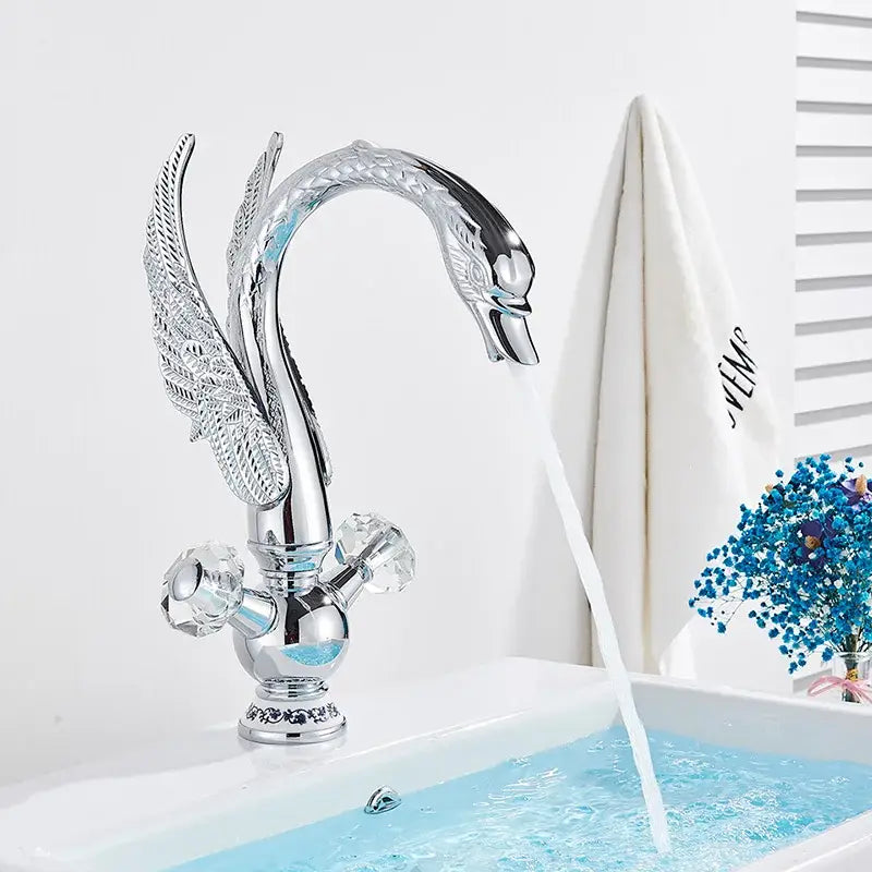Elegant gold swan basin faucet with chrome finish, crystal handles, and detailed wing design by decorbites gold swan