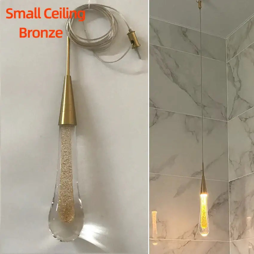 Elegant gold teardrop crystal glass pendant light with bronze finish and golden glitter for dining room decorbites crystal glass