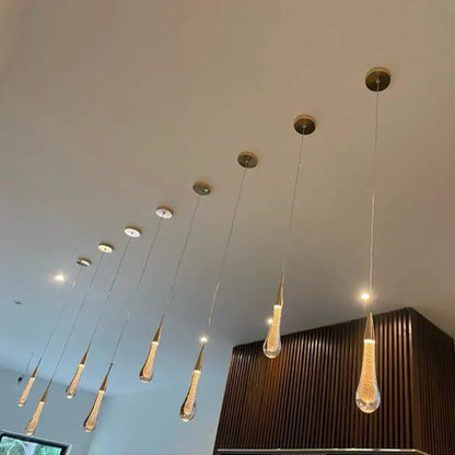 Elegant gold teardrop crystal glass pendant light with brass accents and golden LED decorbites crystal glass decor