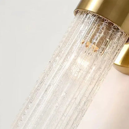 Elegant gold textured glass wall lamp with gold metal base and crackle pattern for warm bedroom lighting decorbites elegant crystal