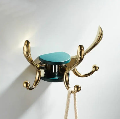Elegant green gold zinc alloy single hook bathroom wall mount with a gold-toned coat hook and teal circular center