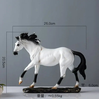 Elegant horse resin statue in white and black resin with flowing mane on a dark stone base for living room decor