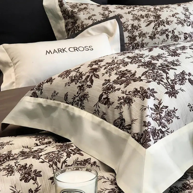 Elegant ivory and dark brown floral egyptian cotton pillowcase with satin trim from mark cross bedding sets