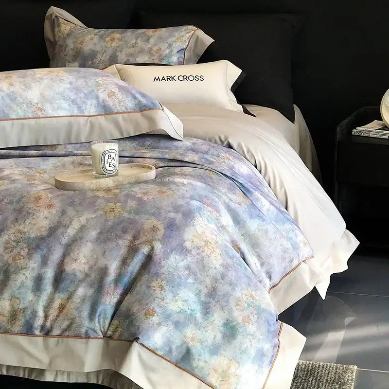 Elegant ivory and dark brown floral egyptian cotton bedding sets featuring a soft watercolor-style floral duvet cover in muted blues and creams