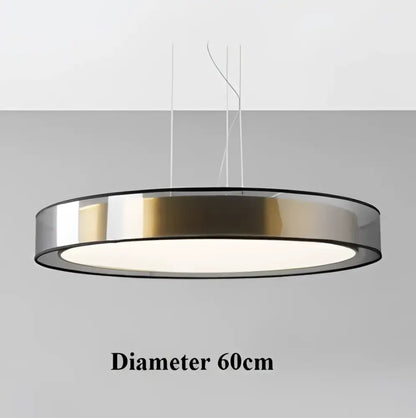 Elegant led dual purpose chandelier with modern circular chrome and brushed gold frame emitting soft white light
