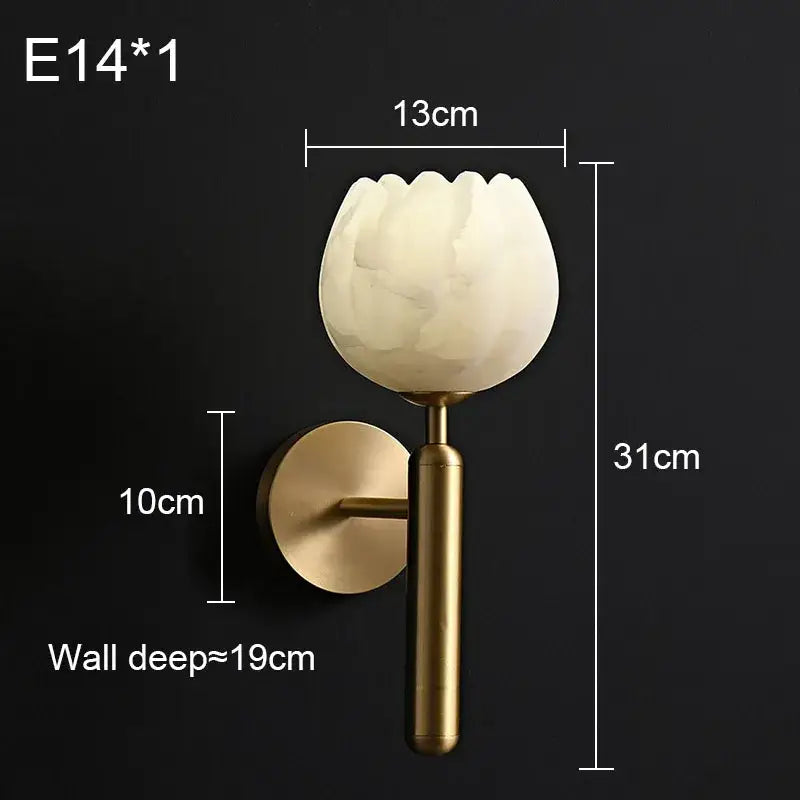 Elegant lotus gold and marble wall lamp with an ivory tulip glass shade mounted on a brass-finished marble wall sconce