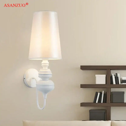 Elegant white asanzuo wall lamps with soft tapered fabric shade and ornate ceramic base from decorbites guards wall lamps set