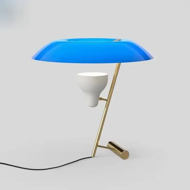 Vibrant blue translucent glass shade on slender gold-toned metal frame with white ceramic bulb holder desk lamp decorbites elegant nordic