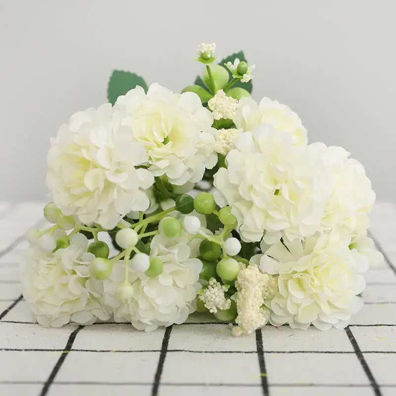 Elegant pink decorbites daisy bouquet featuring artificial white hydrangeas with green berries for living room decor