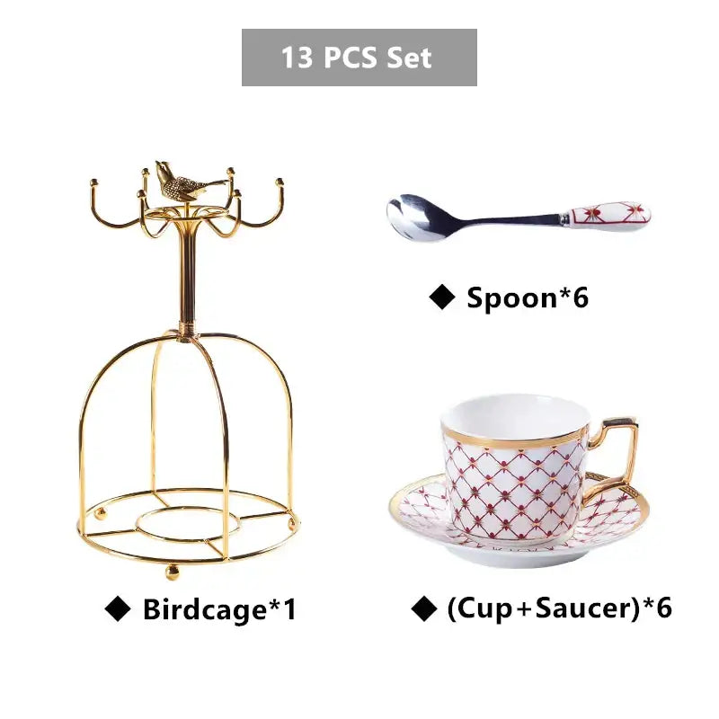 Elegant red and decorbites gold porcelain coffee set featuring a gold birdcage with ornate curved arms and decorative bird