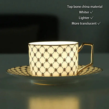Elegant cream-colored bone china teacup with gold rim and black lattice pattern from decorbites gold porcelain set