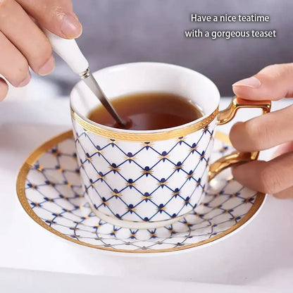 Elegant red and gold porcelain coffee teacup with blue geometric pattern and golden rim for decorbites gold porcelain set