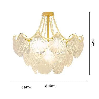 Elegant cream pearl chain chandelier with gold metal frame and translucent shell glass shades for dining room decorbites crystal pearl