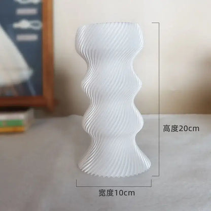 A decorbites elegant white ceramic vase with modern wavy ribbed design 20cm high ideal for living room decorbites elegant high-end decor