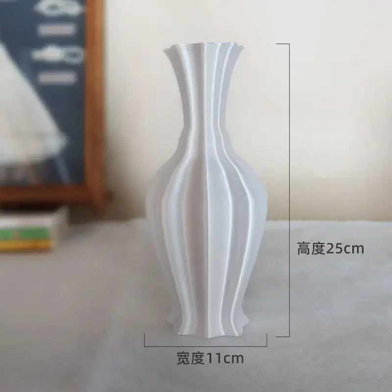 A sleek white ceramic decorbites elegant high-end vase with modern fluted design for living room decor