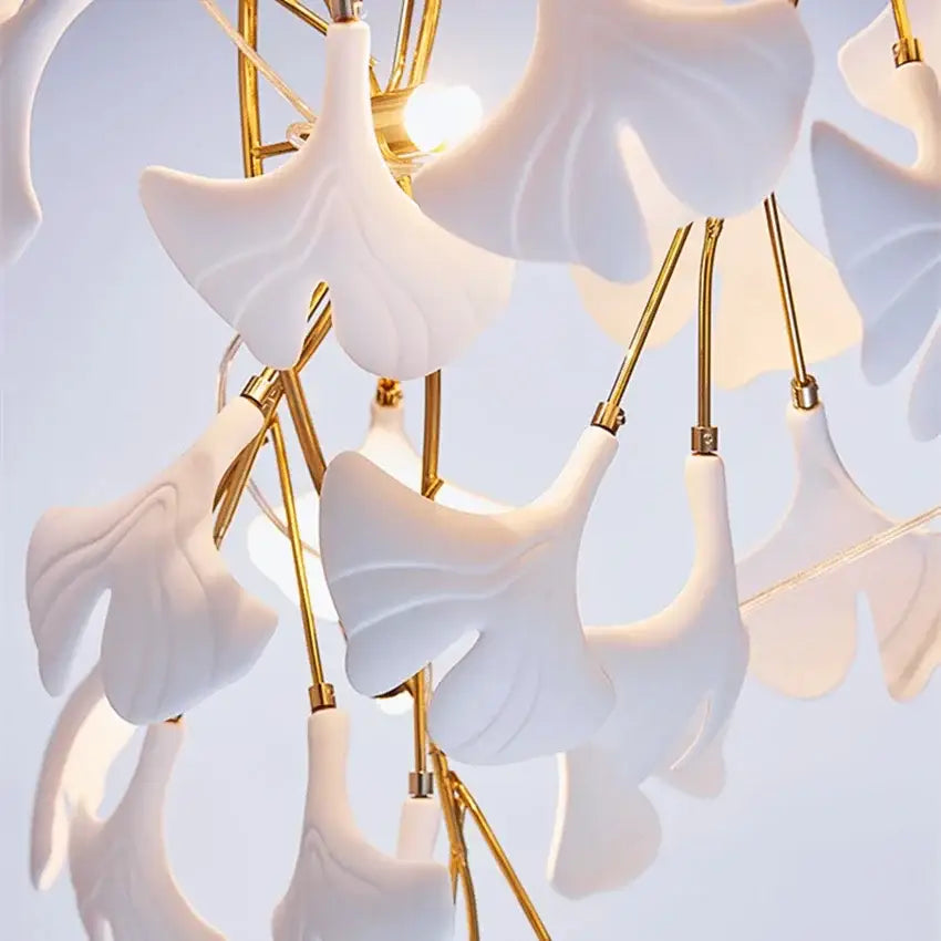 Elegant white and gold ginkgo branch ceramic chandelier with porcelain leaf shades by decorbites for dining room decor