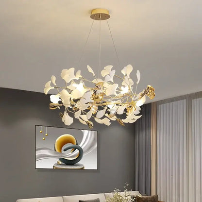 Elegant white and gold ginkgo branch ceramic chandelier with delicate leaf shades for dining room decorbites ginkgo branch