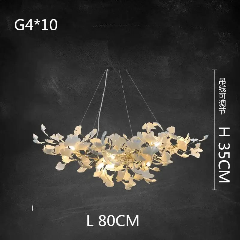 Elegant white and gold ceramic chandelier with a delicate cream floral design featuring ginkgo branch decorbites accents