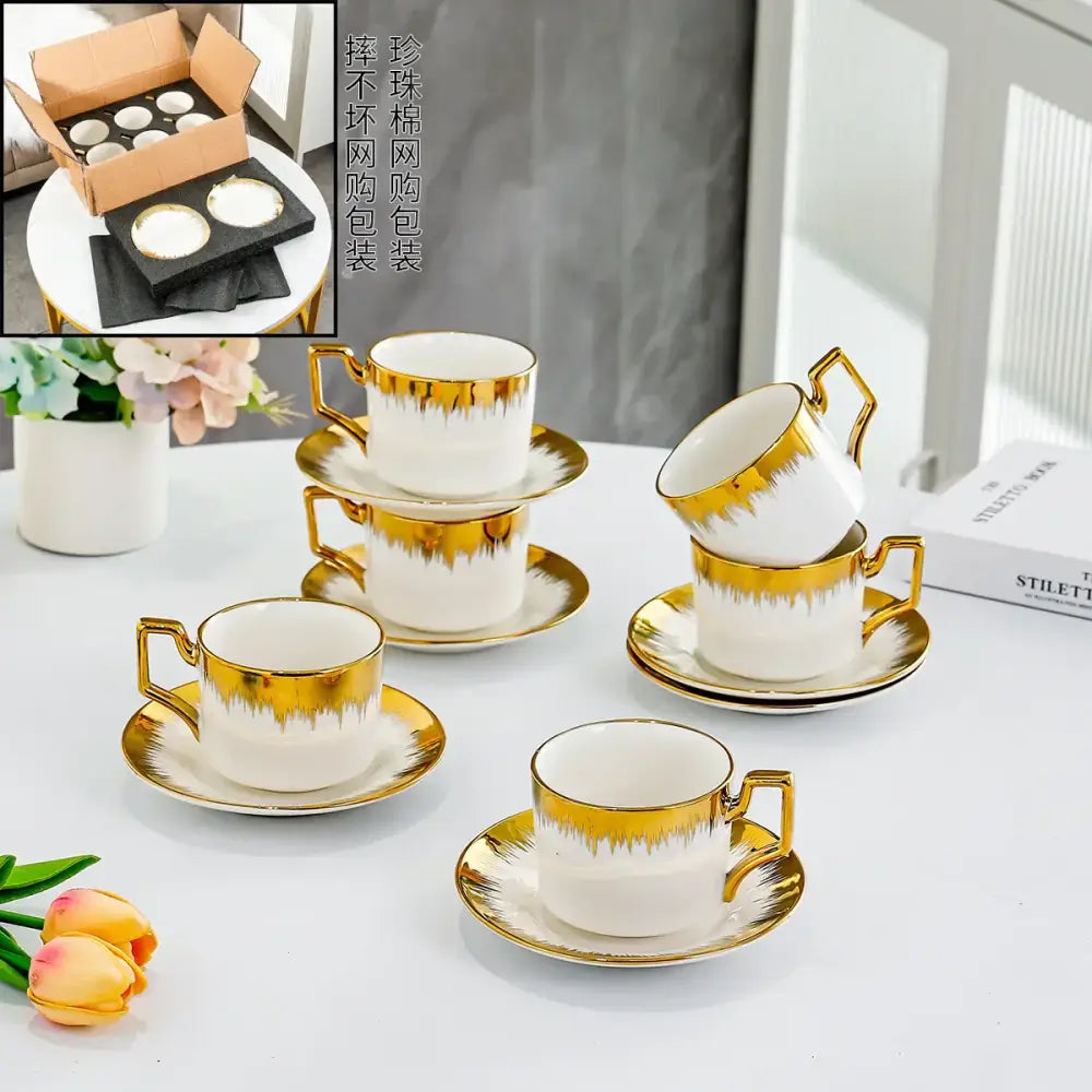 Elegant white and golden ceramic tea cup set with gold-drip detailing by decorbites for dining room drinkware
