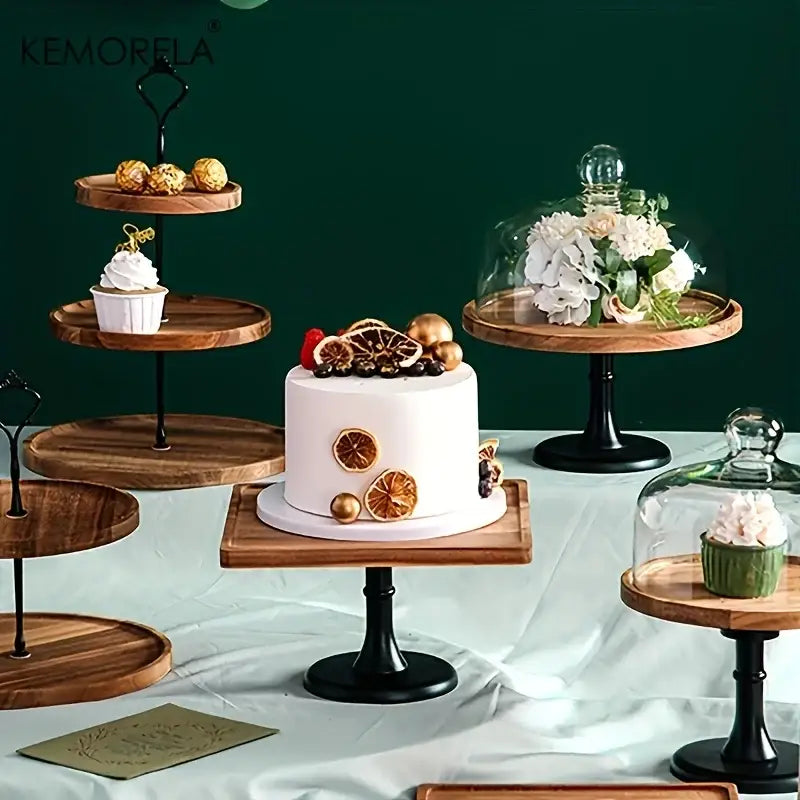Elegant wood and black metal dried fruit tray holding white cake with dried orange slices and gold accents on wooden stand