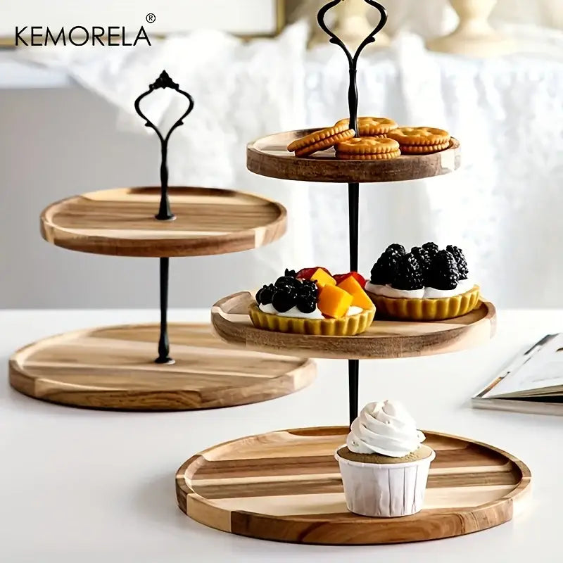 Three-tiered elegant wood and black metal dried fruit tray with wrought iron handles and decorative spindles for dining
