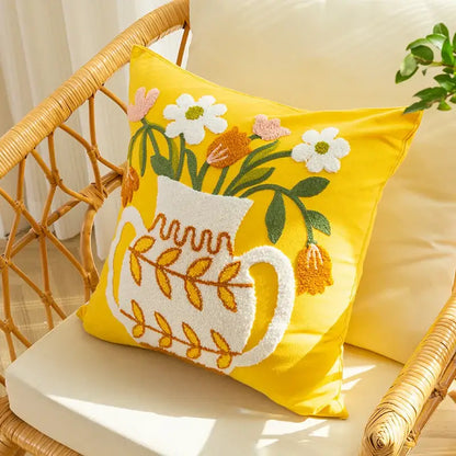 Bright yellow cushion cover with white embroidered vase flower and colorful blooms by decorbites elegant yellow collection