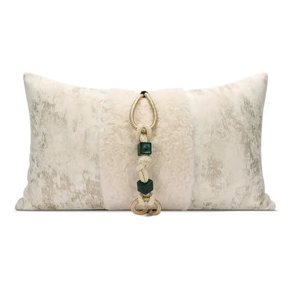 Cream-colored velvet cushion cover with embossed floral texture and central tassel for champagne gold living room decorbites decor