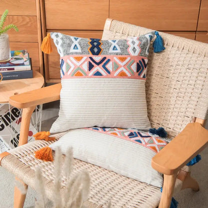 Colorful embroidered blue tufted pillow cover with geometric patterns and tassels for boho bedroom decorbites decor
