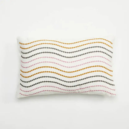 White cushion cover with embroidered daisy dandelion featuring gold gray and pink beaded embroidery for living room decor