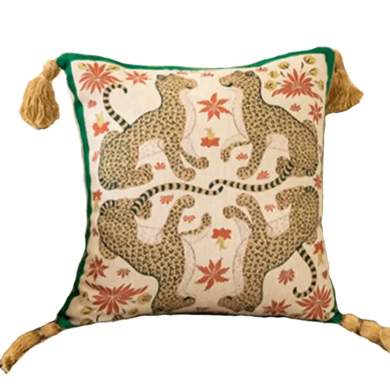 Embroidered elephant jungle paradise throw pillow with embroidered cheetahs red floral accents and golden tassels decorbites elephant jungle decor