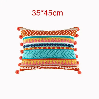 Embroidered flower boho flower boho long cushion covers with vibrant geometric patterns and red pom-pom trim
