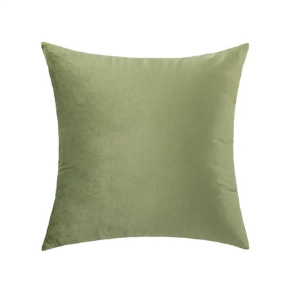 A soft sage green velvet throw pillow with plush texture ideal as an embroidered flower pillowcase cover