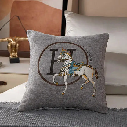 Gray cotton throw pillow cover featuring an embroidered white horse with blue and gold tack for decorbites cotton home decor