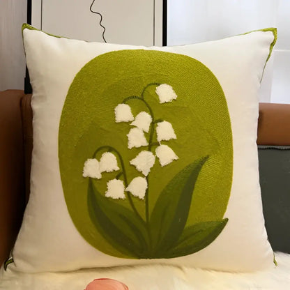 Cream-colored square pillowcase with embroidered lily of the valley on a green oval for decorbites blue hyacinth square